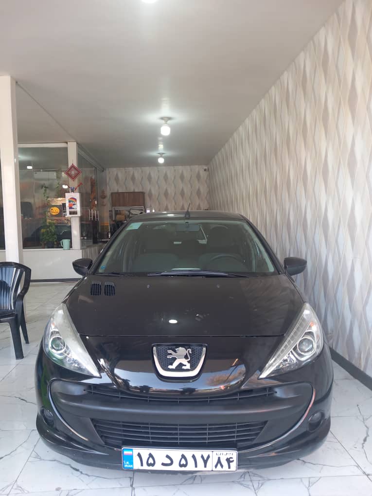 پژو 207 در حد مدل 1400 رنگ مشکی کم کارکرد خانگی