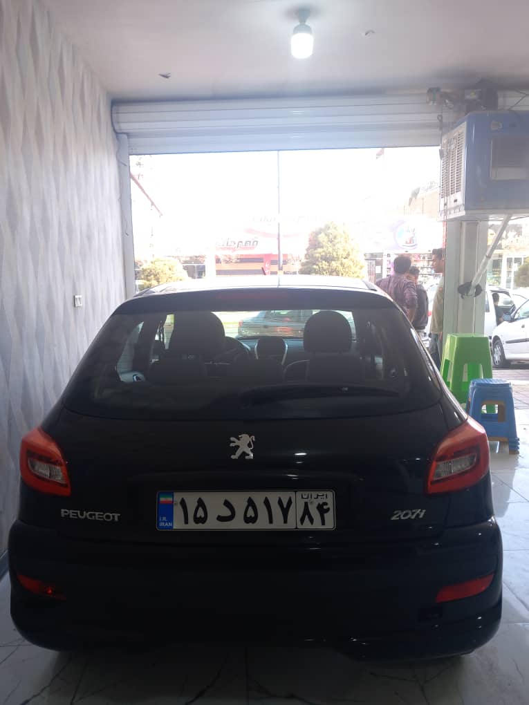 پژو 207 در حد مدل 1400 رنگ مشکی کم کارکرد خانگی